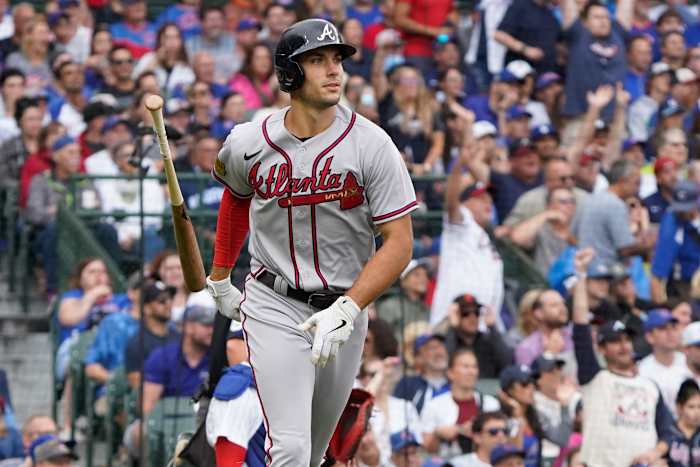 Aug 6, 2023; Chicago, Illinois, USA; Atlanta Braves first baseman Matt Olson (28) hits a two-run home run against the Chicago Cubs during the third inning at Wrigley Field.